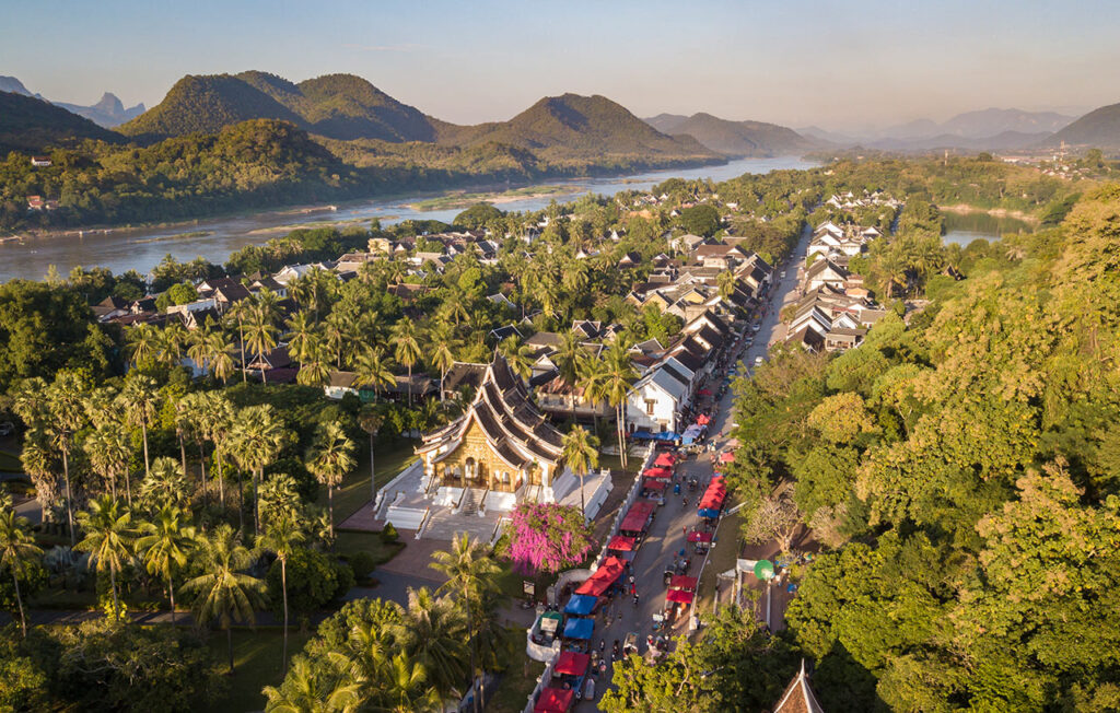 Luang Prabang — River Arrival, Sacred Caves, and Timeless Rituals