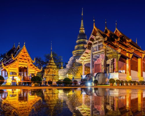 Wat Phra Singh temple at night in Chiang Mai, Thailand.